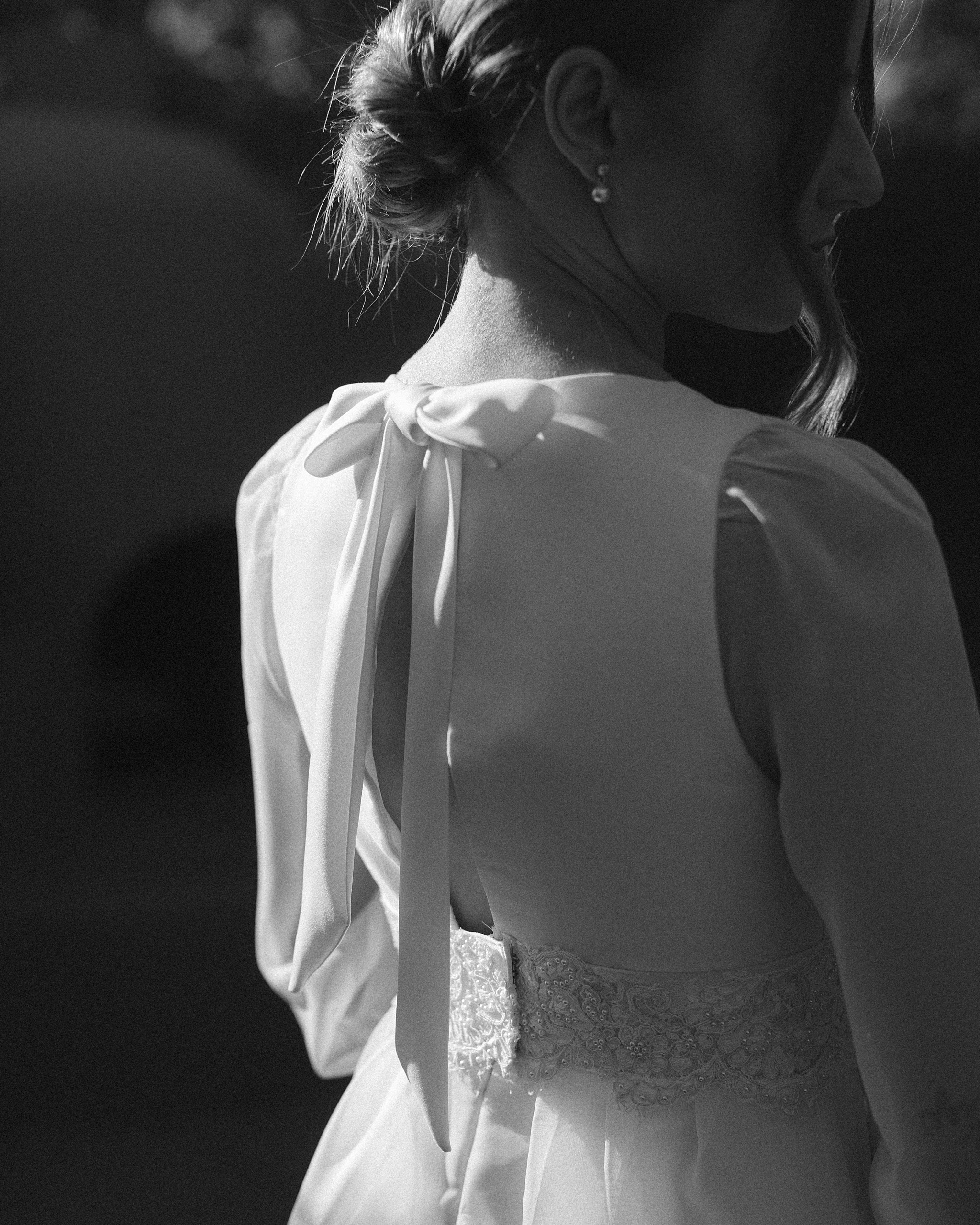 Close-up of bride’s handmade lace wedding dress, lovingly crafted by her mother, at an intimate desert wedding at The Boulders Resort
