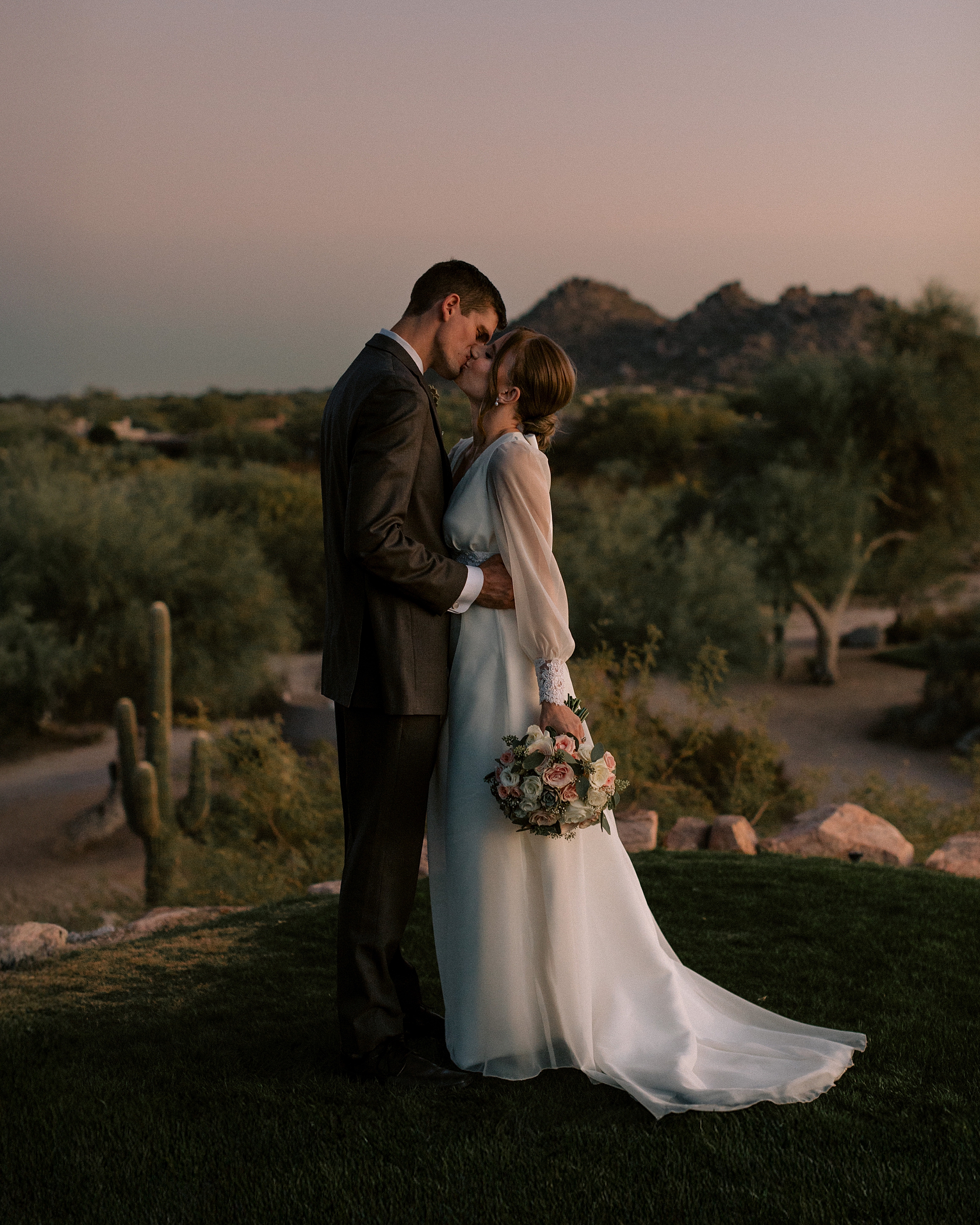 Bride and Groom kissing at the Boulders Resort