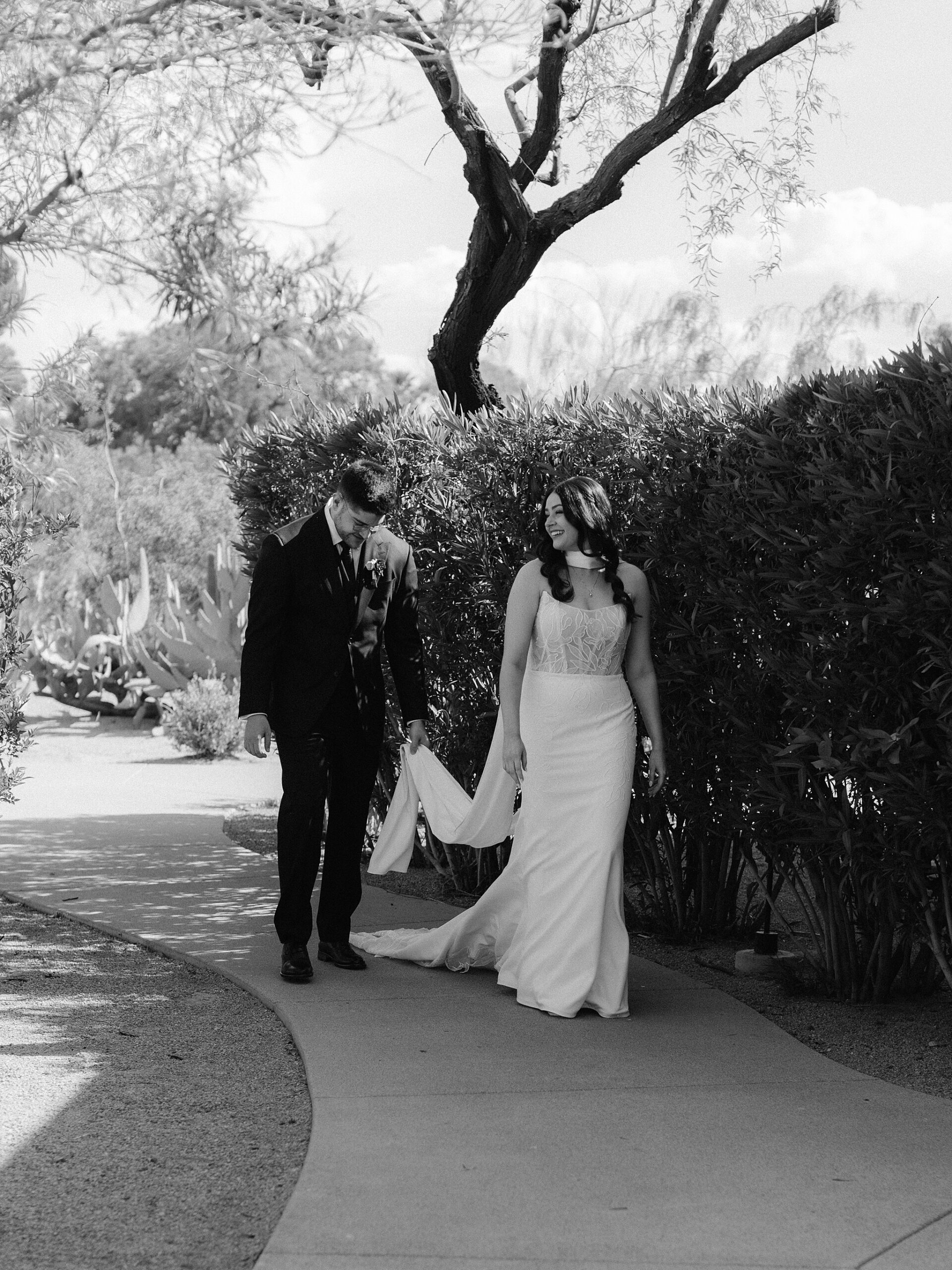 Couple walking together through the courtyard at Andaz Scottsdale