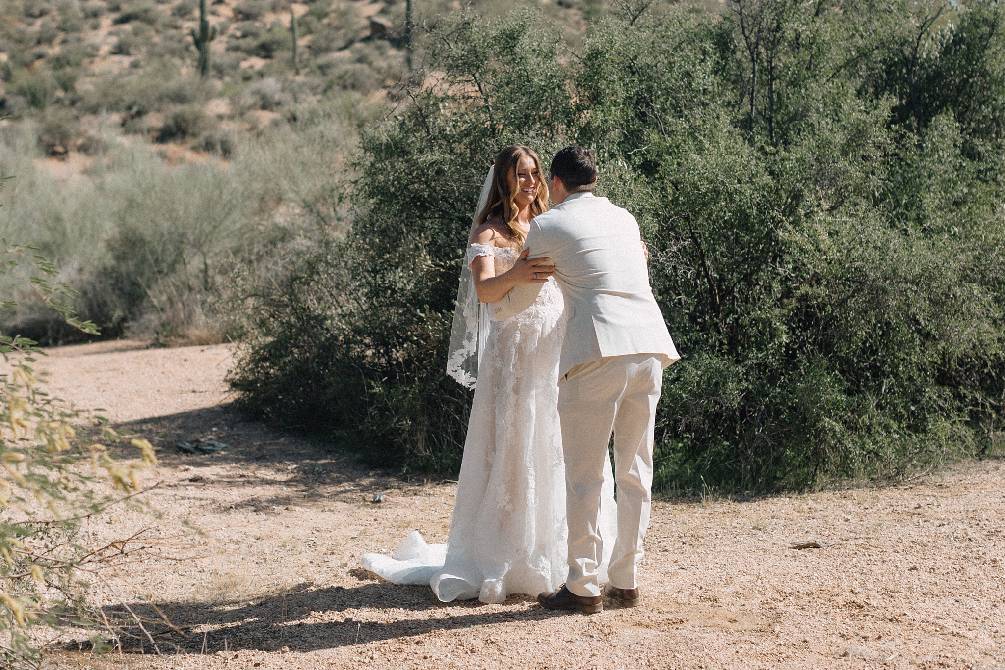 Bride and groom exchanging vows in the Arizona desert