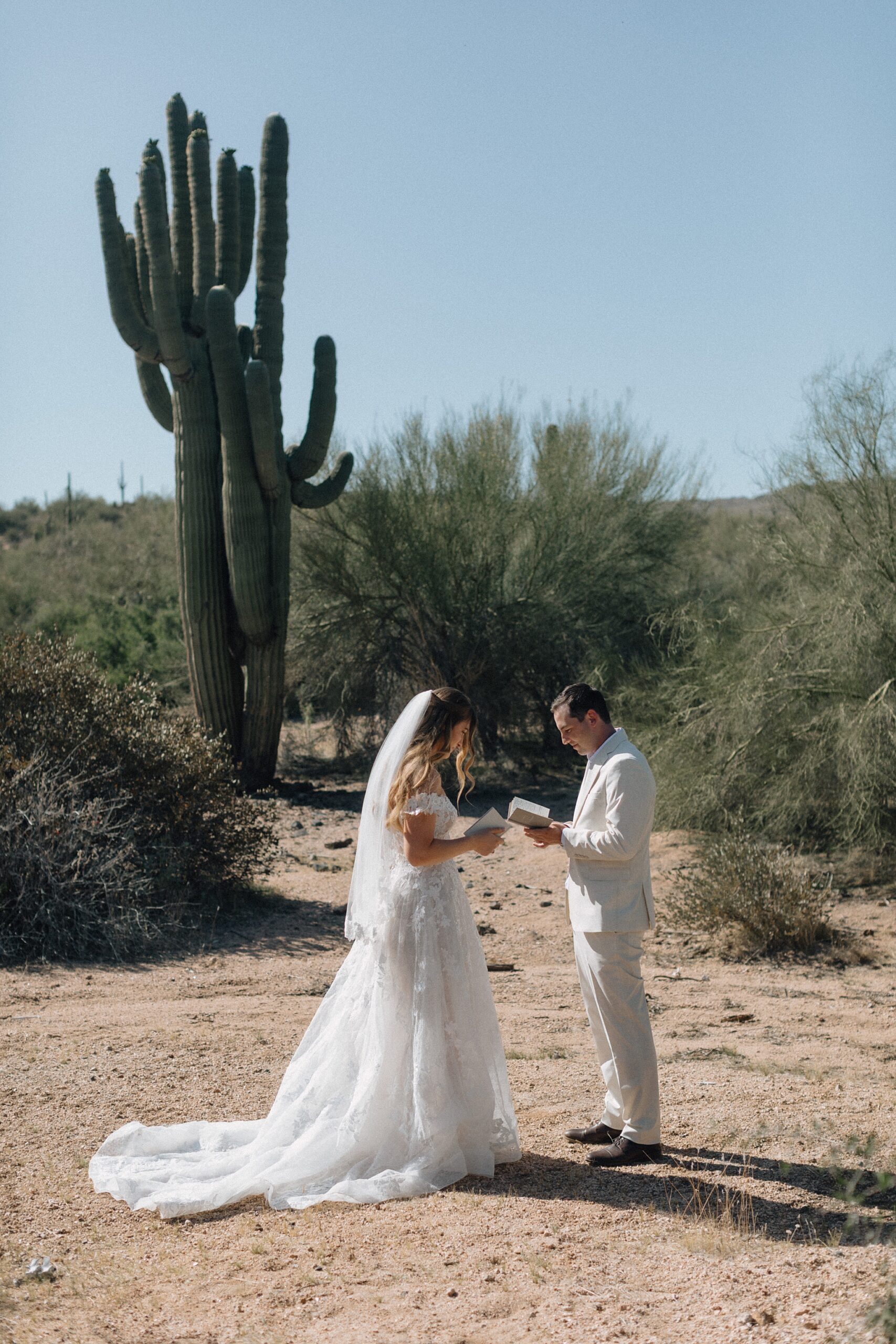 Bride and groom exchanging vows in the Arizona desert