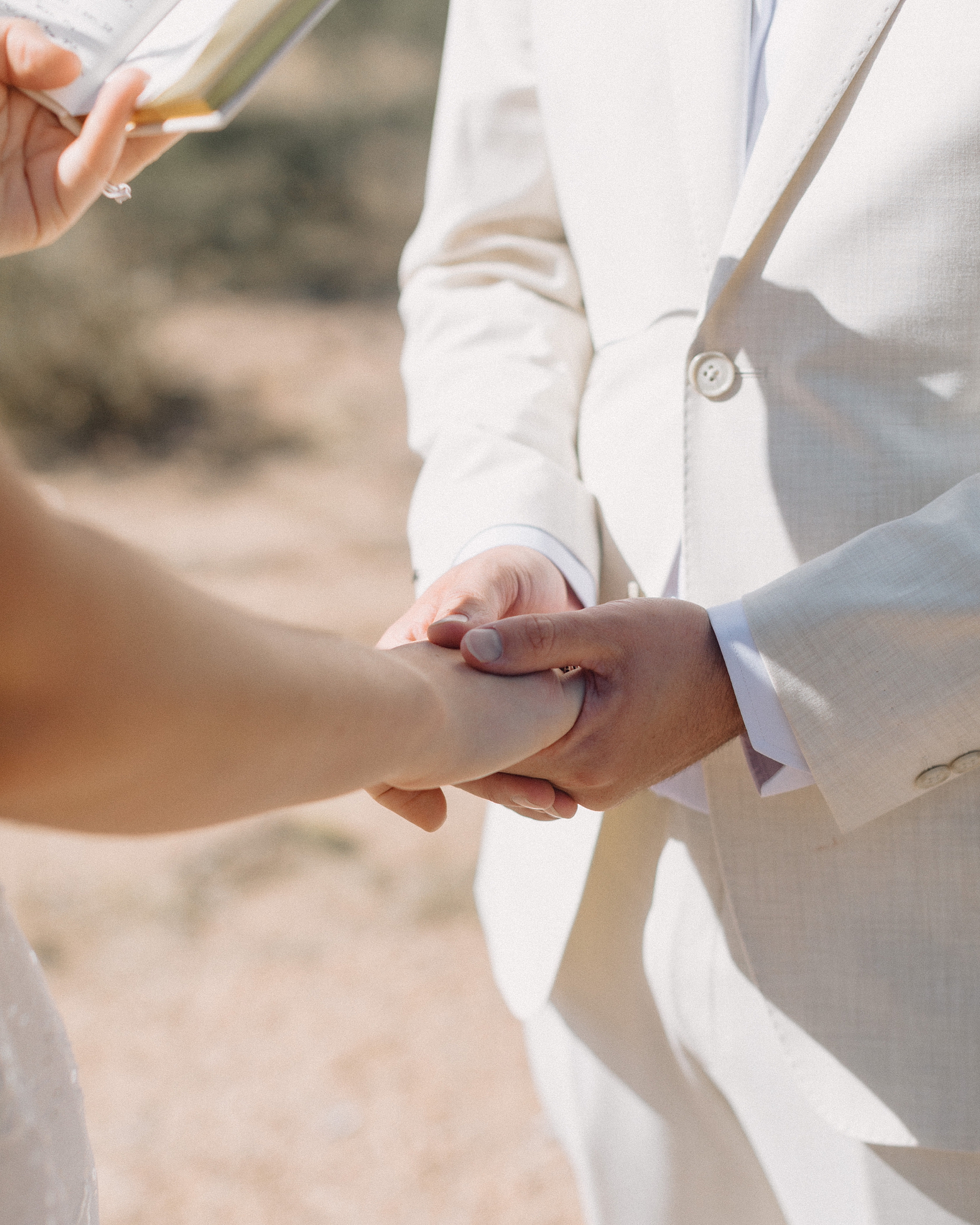 Bride and groom exchanging vows in the Arizona desert