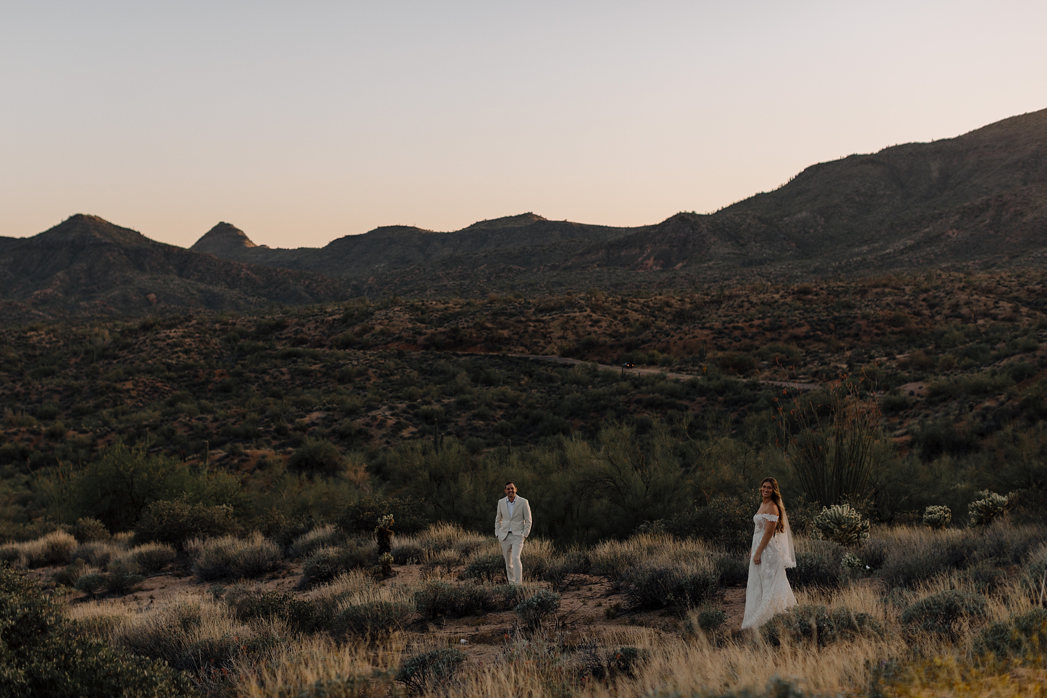 Golden hour light over Arizona wedding couple