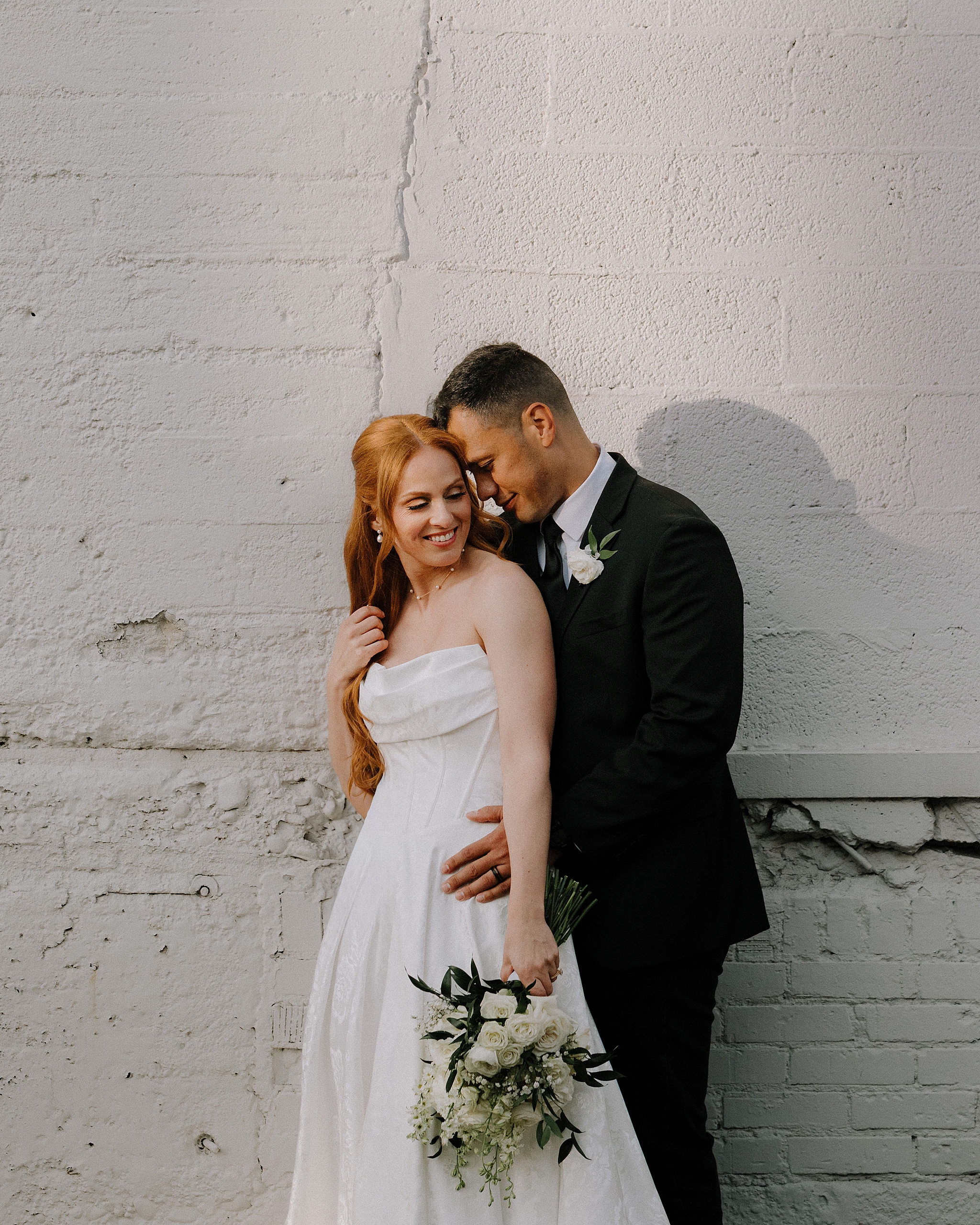 Bride and Groom holding each other in Downtown Phoenix