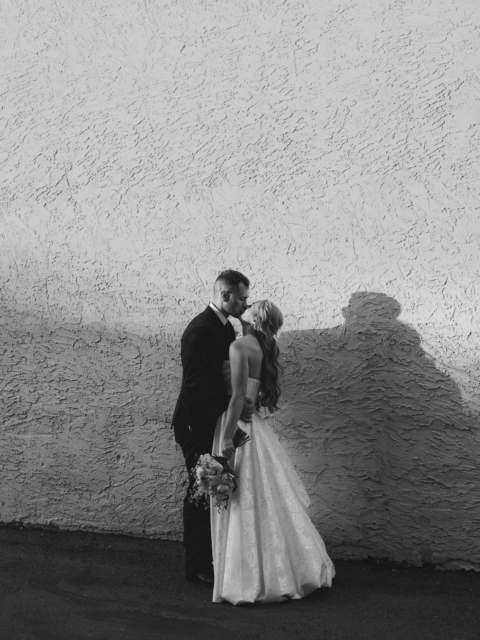 Bride and Groom kissing in Downtown Phoenix