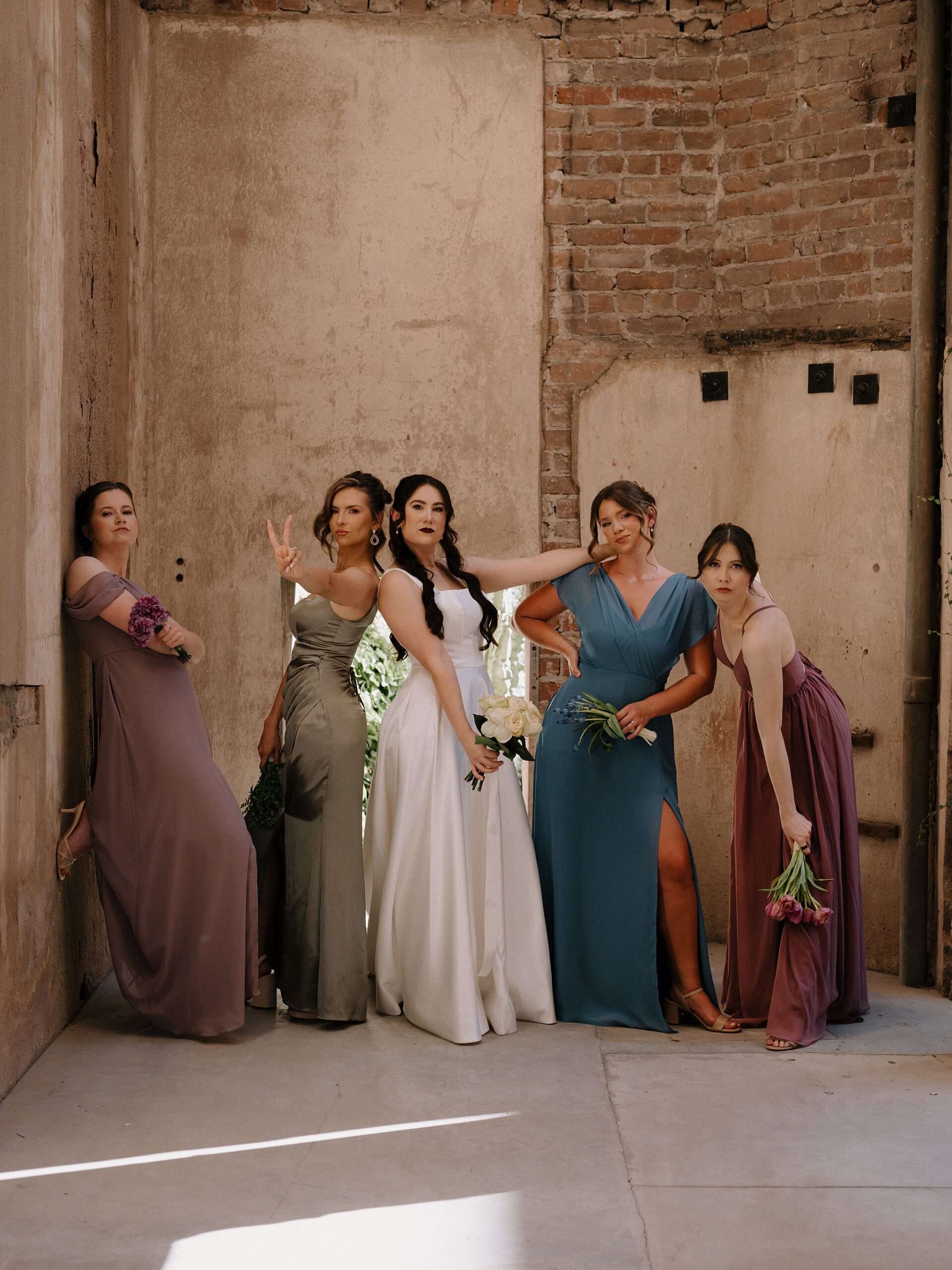 Bride and Bridemaids in the courtyard at the Monroe street abbey in Phoenix, Arizona