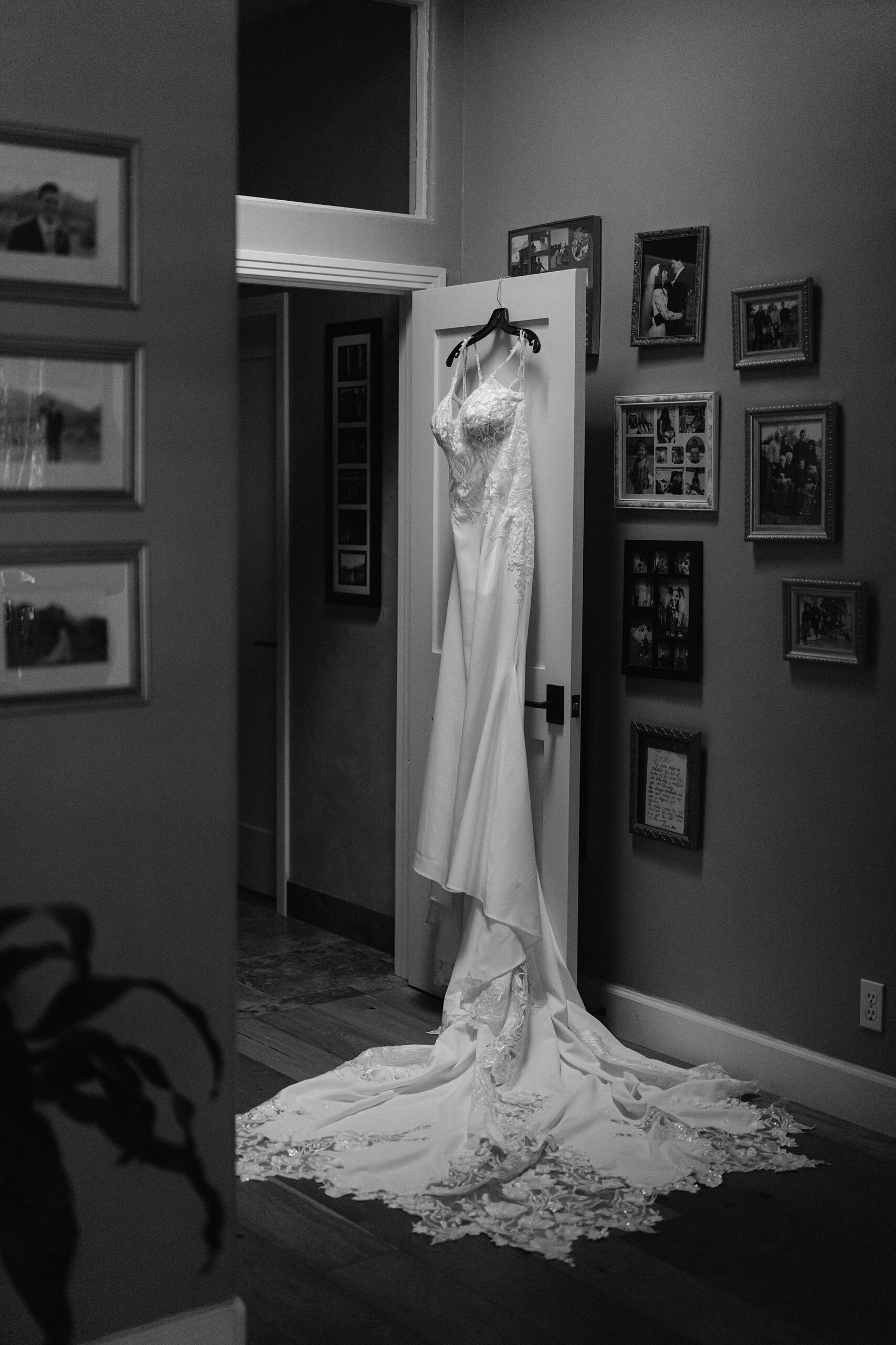 Wedding Dress hanging on a door at a backyard wedding in Phoenix, AZ 