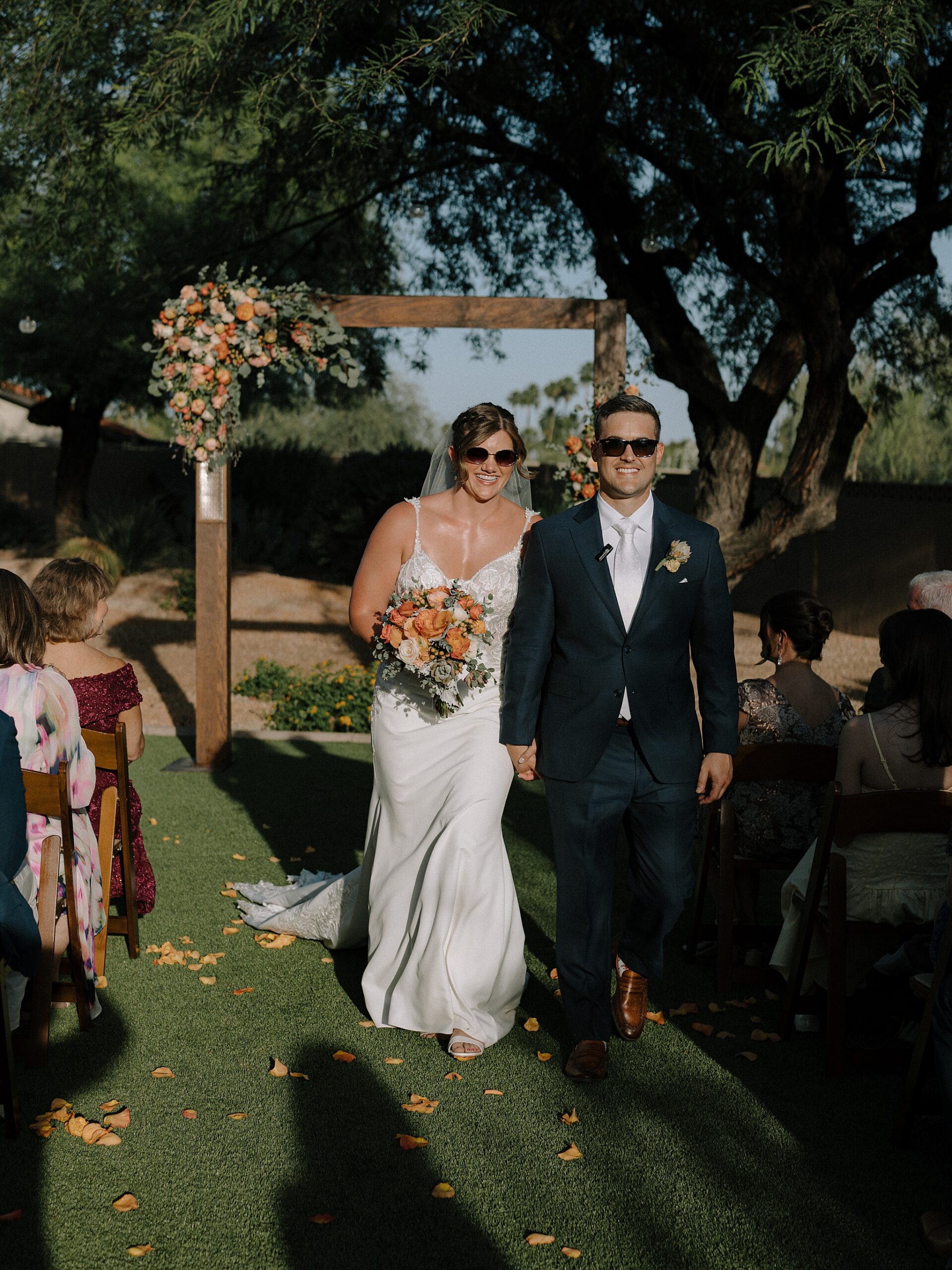 Bride and Groom Smiling at a Backyard wedding ceremony in Phoenix, AZ