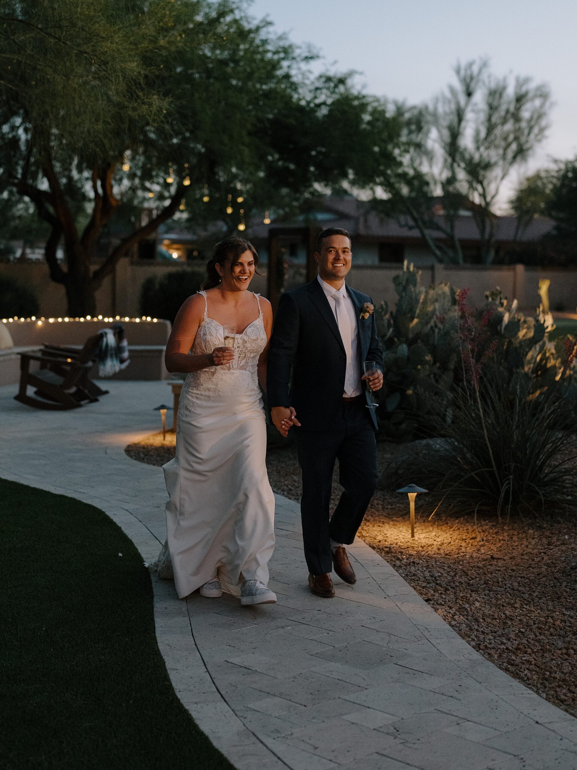 Wedding reception dinner on basketball court Phoenix backyard wedding
