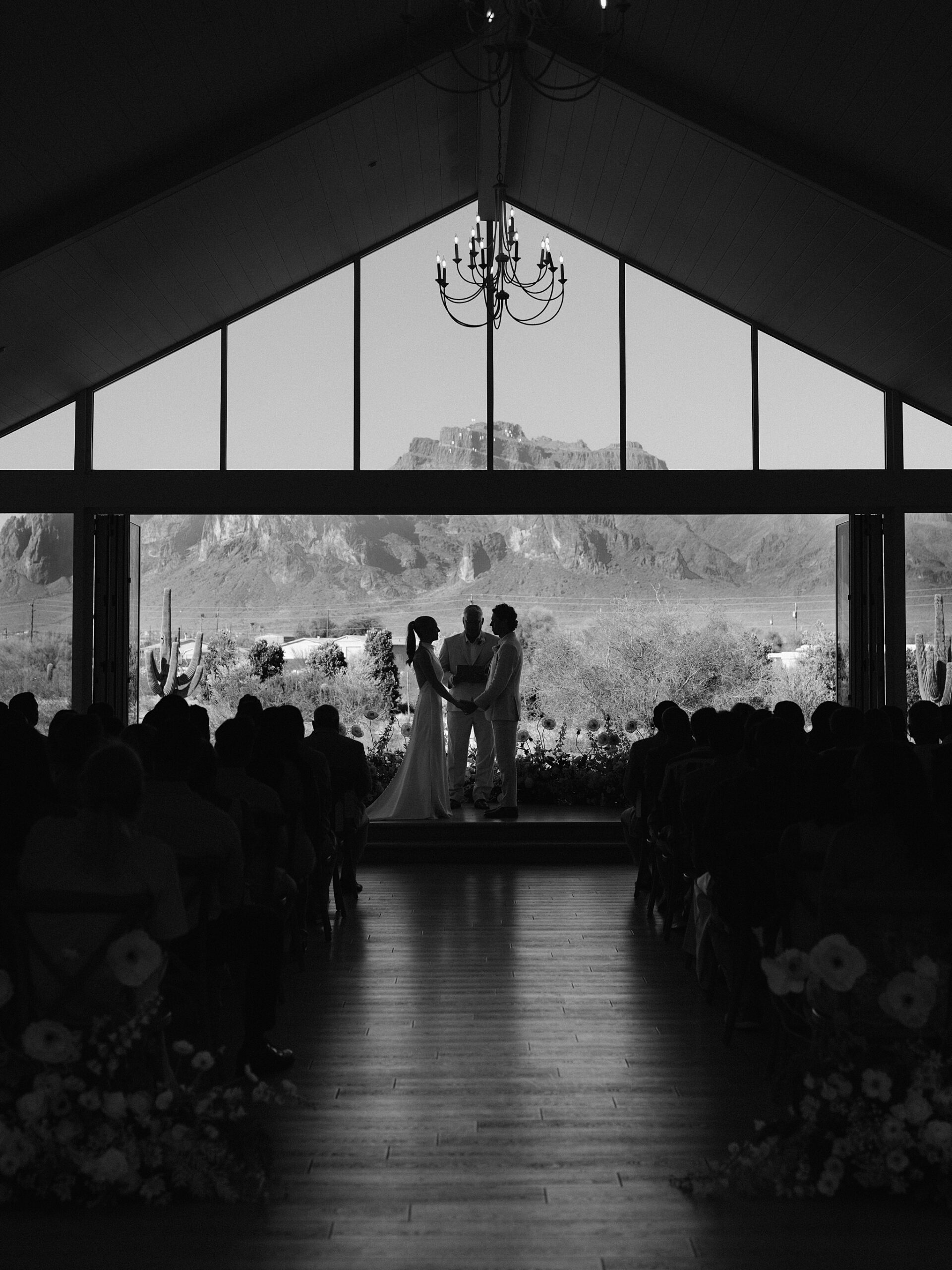 Bride and groom ceremony at Desert View Weddings & Events with the Superstition Mountains in the background